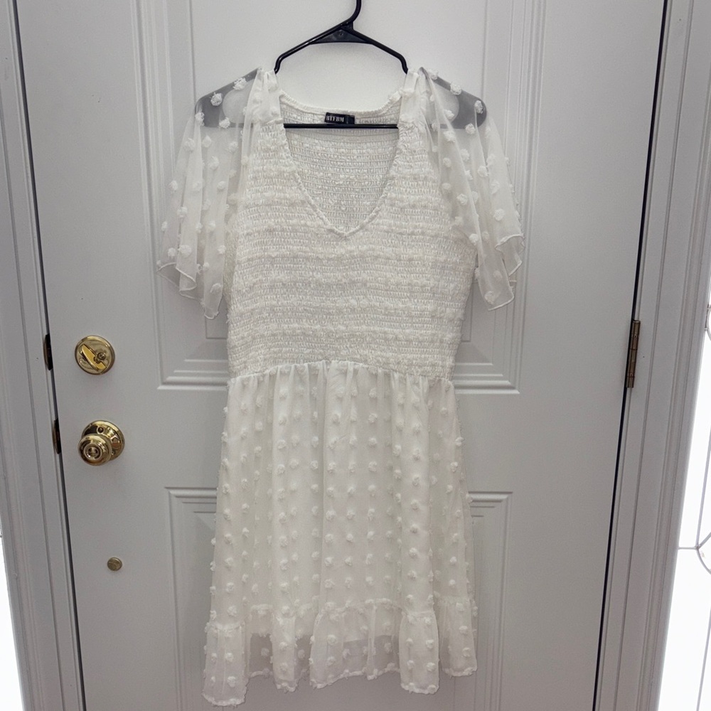 Chic White Midi Dress with Polka Dot Sleeves